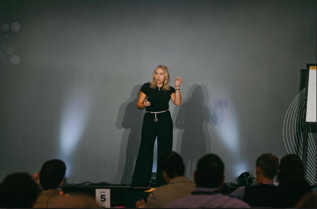 Sally Dominguez giving a keynote on stage